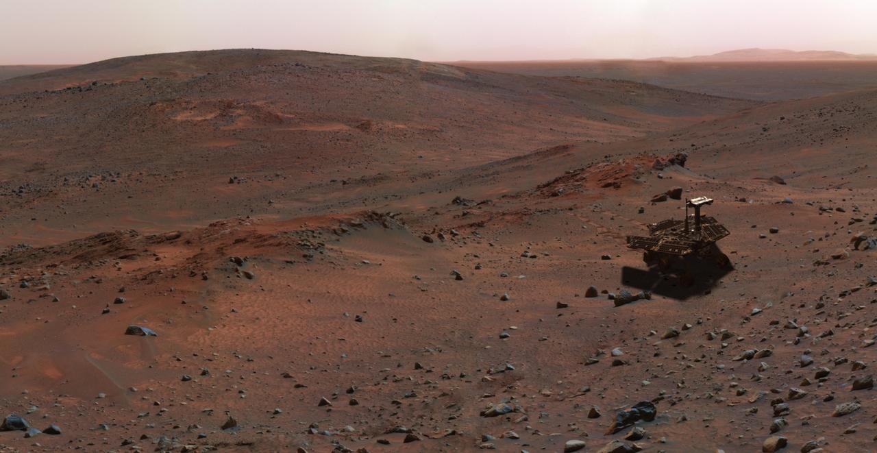This synthetic image of NASA Spirit Mars Exploration Rover on the flank of Husband Hill was produced using Virtual Presence in Space technology.