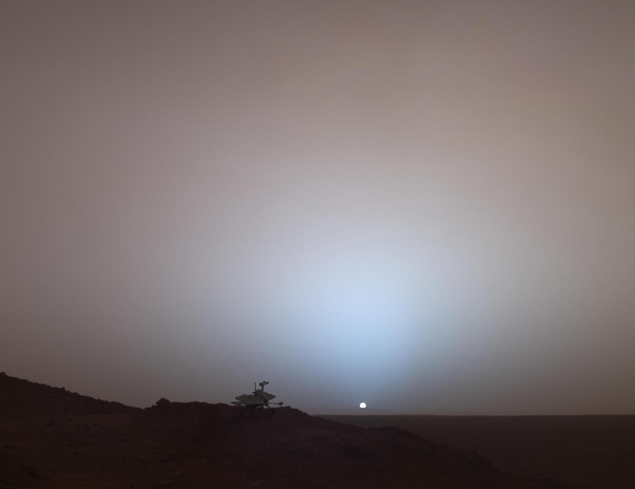 This synthetic image of NASA Spirit Mars Exploration Rover on top of a rock called Jibsheet was produced using Virtual Presence in Space technology.