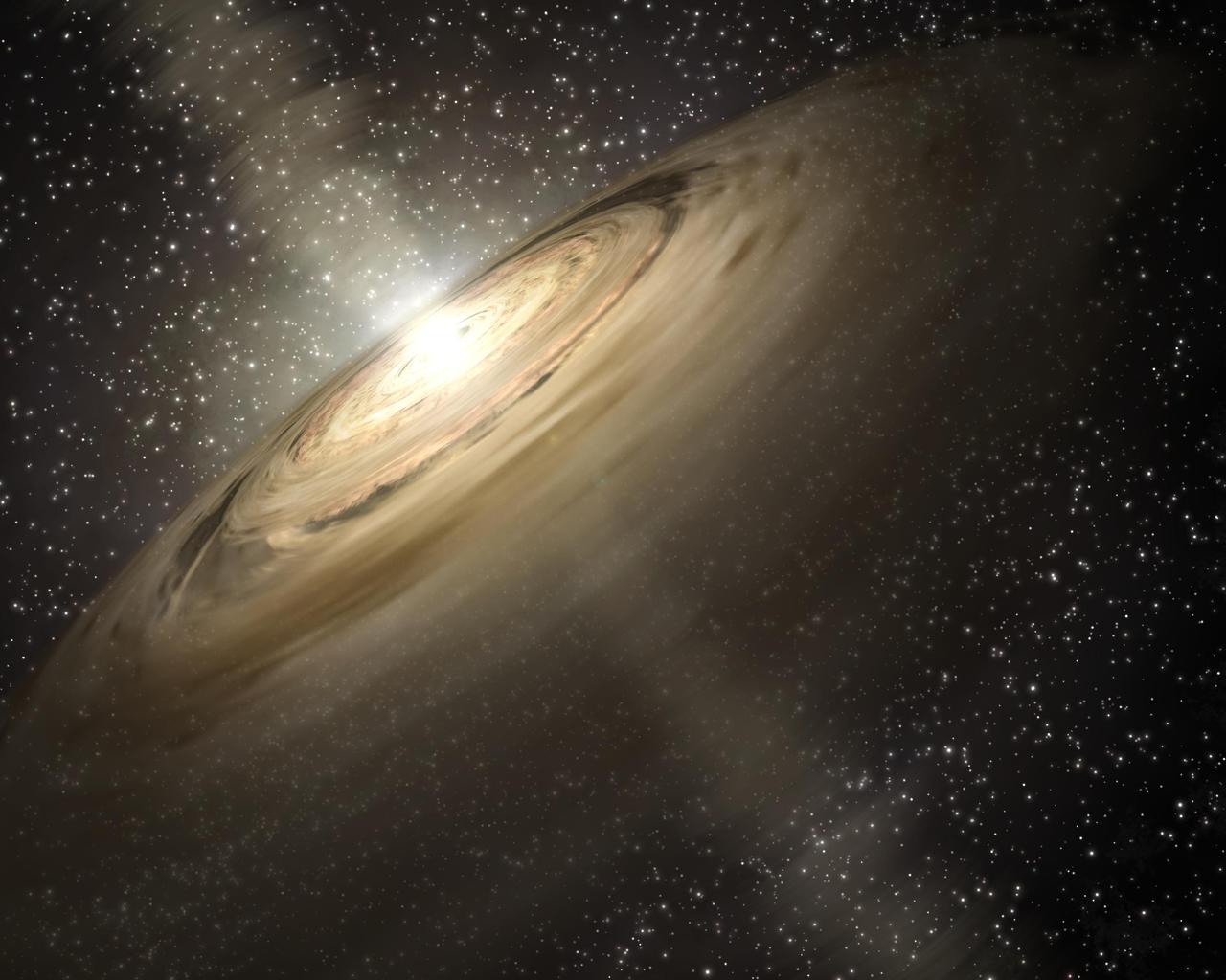 This artist concept illustrates a solar system that is a much younger version of our own. Dusty disks, like the one shown here circling the star, are thought to be the breeding grounds of planets, including rocky ones like Earth.