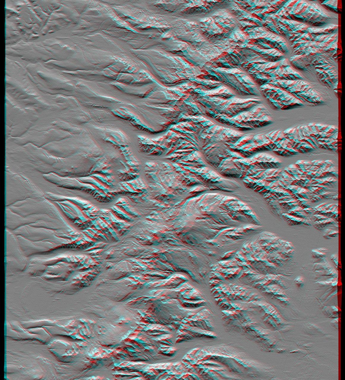 This anaglyph, from NASA Shuttle Radar Topography Mission, shows the Kamchatka Peninsula in eastern Russia. Sredinnyy Khrebet, the mountain range that makes up the spine of the peninsula. 3D glasses are necessary to view this image.