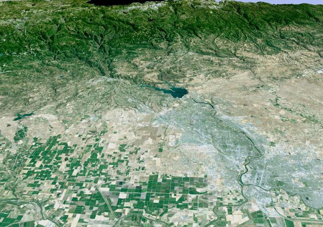 California state capitol, Sacramento, can be seen clustered along the American and Sacramento Rivers in this computer-generated perspective viewed from the west.