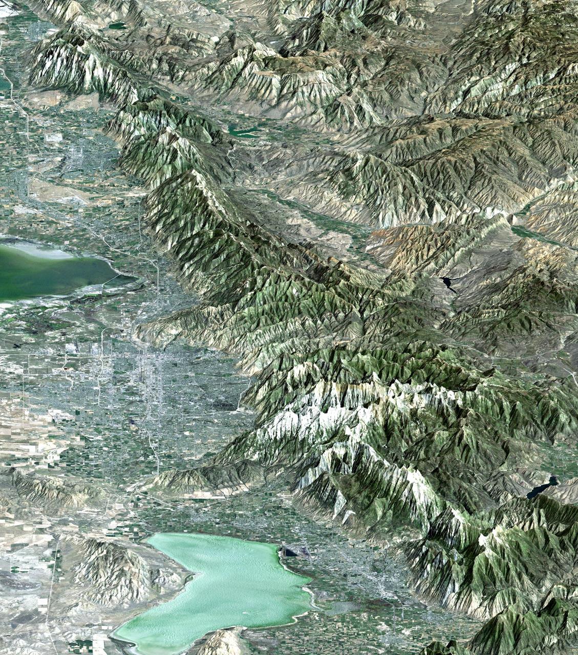 The 2002 Winter Olympics are hosted by Salt Lake City at several venues within the city, in nearby cities, and within the adjacent Wasatch Mountains.