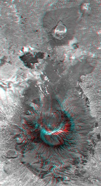 This anaglyph, from NASA Shuttle Radar Topography Mission, is of Mount Meru, an active volcano located just 70 kilometers 44 miles west of Mount Kilimanjaro. 3D glasses are necessary to view this image.