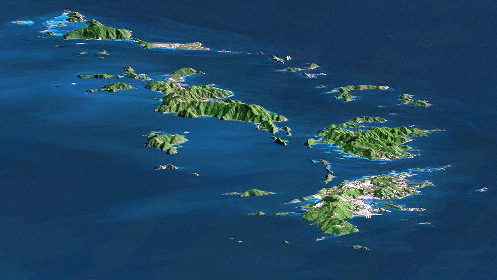 St. Thomas, St. John, Tortola, and Virgin Gorda are the four main islands front to back of this east-looking view of the U.S. Virgin Islands and British Virgin Islands, along the northeast perimeter of the Caribbean Sea.