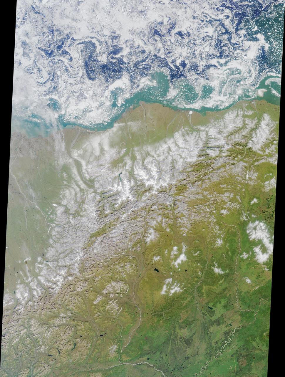 This colorful image of the Arctic National Wildlife Refuge and the Beaufort Sea was acquired by the NASA Terra satellite on August 16, 2000, during Terra orbit 3532.