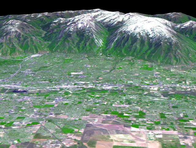 The 2002 Winter Olympics are hosted by Salt Lake City at several venues within the city, in nearby cities, and within the adjacent Wasatch Mountains. This 3-D perspective view, in simulated natural colors, presents a late spring view over Salt Lake City towards the snow-capped Wasatch Mountains to the east. The image was created by draping ASTER image data over digital topography data from the US Geological Survey's National Elevation Data.  This image was acquired on May 28, 2000 by the Advanced Spaceborne Thermal Emission and Reflection Radiometer (ASTER) on NASA's Terra satellite. With its 14 spectral bands from the visible to the thermal infrared wavelength region, and its high spatial resolution of 15 to 90 meters (about 50 to 300 feet), ASTER will image Earth for the next 6 years to map and monitor the changing surface of our planet.  http://photojournal.jpl.nasa.gov/catalog/PIA03466