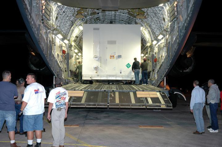 NASA Mars Reconnaissance Orbiter was delivered in two large containers from Lockheed Martin to Cape Canaveral on an Air Force C-17 cargo plane.
