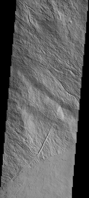 This image shows part of the flank and margin of Ascraeus Mons