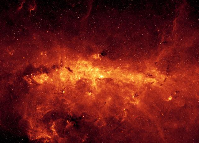 NASA image: The Milky Way Center Aglow with Dust