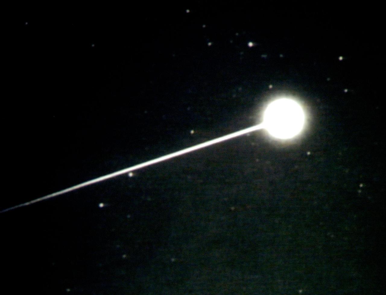 Stardust Capsule Return as seen from NASA DC-8 Airborne Laboratory with  a mission to explore the conditions during reentry from the light emitted  by the fireball caused when the capsule streaked through the sky