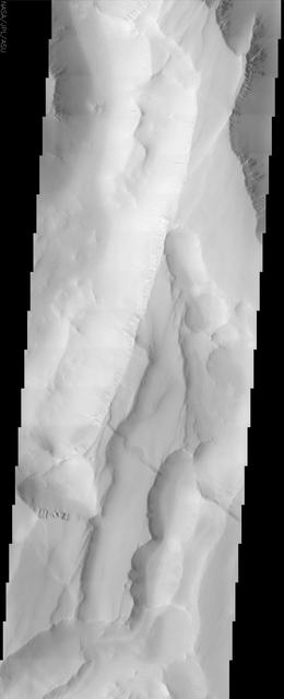 This image from NASA Mars Odyssey shows Noctis Labyrinthus, a large valley system at the western end of the Valles Marineris canyon system notable for a pattern of intersecting valleys, which give it a maze-like appearance when viewed from above.