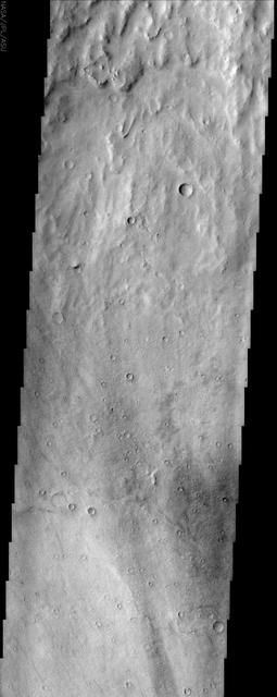 This NASA Mars Odyssey image shows a close-up view of the ridged plains in Hesperia Planum, a classic locality for Martian surfaces that formed in the middle ages of the planet history.
