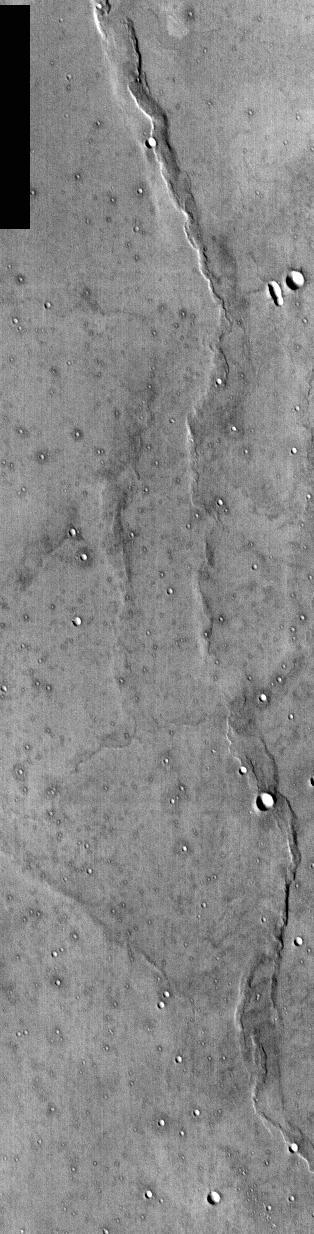 This NASA Mars Odyssey image of NASA Viking 1 landing site was taken to commemorate the anniversaries of NASA Apollo 11 landing on the Moon and Viking 1 landing on Mars -- July 20, 1969 and July 20, 1976, respectively.