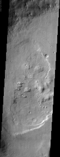Lineations fissures, or cracks in the ground can be seen in this image of Acidalia Planitia from NASA Mars Odyssey spacecraft and create what is referred to as patterned ground or polygonal terrain.