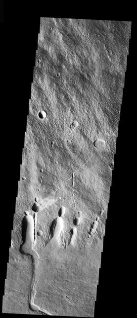 NASA image: Collapse Features on Arsia Mons