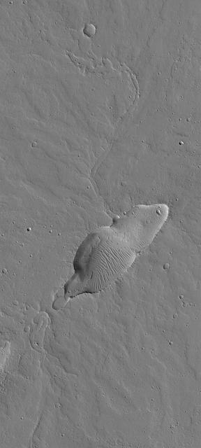 NASA image: Small Dusty Volcano