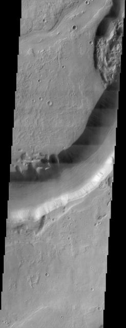 This NASA Mars Odyssey image shows Dao Vallis, a large outflow channel that starts on the southeast flank of a large volcano called Hadriaca Patera and runs for 1,000 kilometers about 620 miles southwest into the Hellas impact basin. http://photojournal.jpl.nasa.gov/catalog/PIA04009