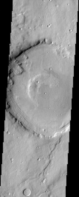 The impact crater in this NASA Mars Odyssey image is a model illustration of the effects of erosion on Mars. The degraded crater rim and several landslides observed in crater walls are evidence of the mass wasting of materials.