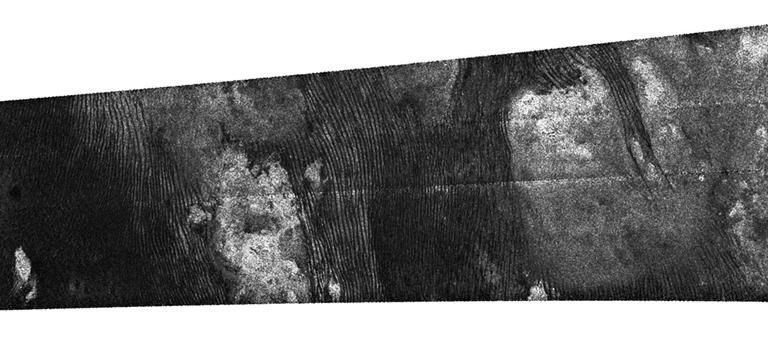 This image was obtained by NASA's Cassini radar instrument during a flyby on July 8, 2009. The radar antenna was pointing toward Titan at a 900 km altitude at the closest approach.  The image has been processed with a resolution of 128 pixels/deg.  https://photojournal.jpl.nasa.gov/catalog/PIA04398