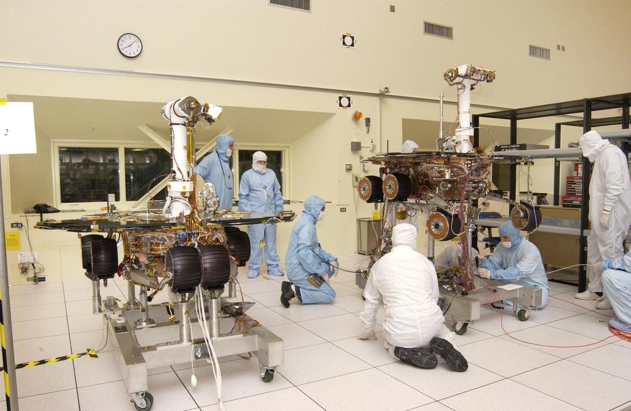 JPL engineers making adjustments to NASA Mars Exploration Rover 1.
