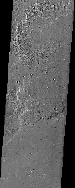 Interesting textures on lava flows in Daedalia Planum, southwest of the Tharsis volcanoes, can by observed in this image from NASA Mars Odyssey spacecraft.