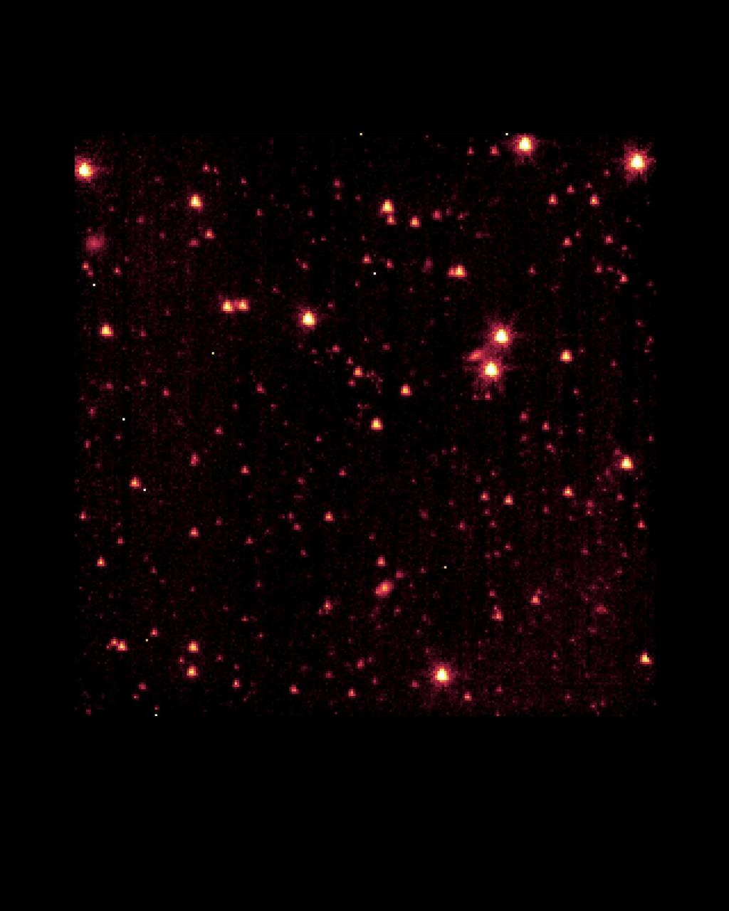 This engineering image derives from 100 seconds of observing time on one of the three science instruments aboard the Space InfraRed Telescope Facility (SIRTF). SIRTF was launched on August 25, and opened up its focal plane to starlight on August 30. This image was obtained as part of the instrument power-on sequence on September 1, one week after launch and a full month before the telescope is expected to reach optimal operating temperature and focus. The stars and galaxies seen in this image already attest to the observatory's great sensitivity in the infrared and to its proper operation.  The Space Infrared Telescope Facility (SIRTF) telescope was renamed the Spitzer Space Telescope on December 18, 2003, after the late Dr. Lyman Spitzer, in a contest which was open to the general public.   http://photojournal.jpl.nasa.gov/catalog/PIA04724