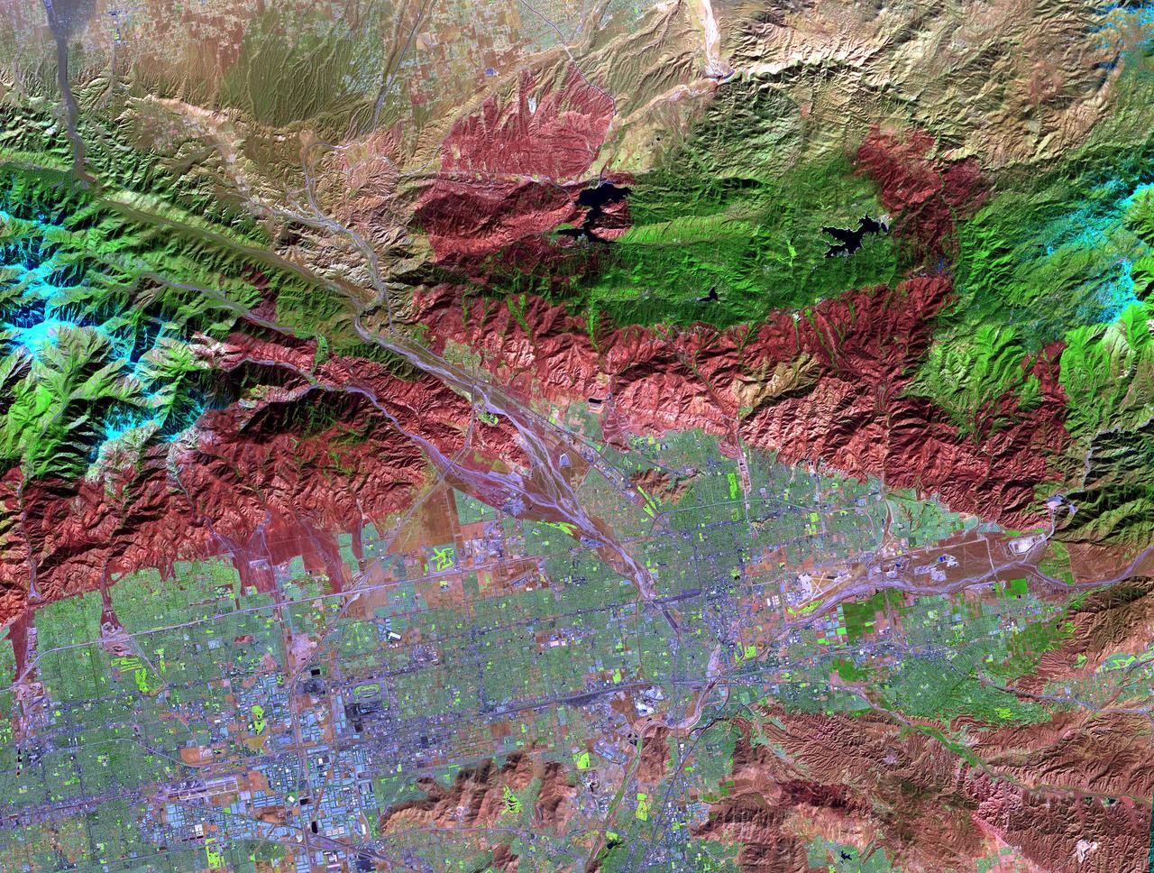 On November 18, 2003, the Advanced Spaceborne Thermal Emission and Reflection Radiometer (ASTER) on NASA's Terra satellite acquired this image of the Old Fire/Grand Prix fire east of Los Angeles. The image is being processed by NASA's Wildfire Response Team and will be sent to the United States Department of Agriculture's Forest Service Remote Sensing Applications Center (RSAC) which provides interpretation services to Burned Area Emergency Response (BAER) teams to assist in mapping the severity of the burned areas. The image combines data from the visible and infrared wavelength regions to highlight the burned areas. http://photojournal.jpl.nasa.gov/catalog/PIA04879