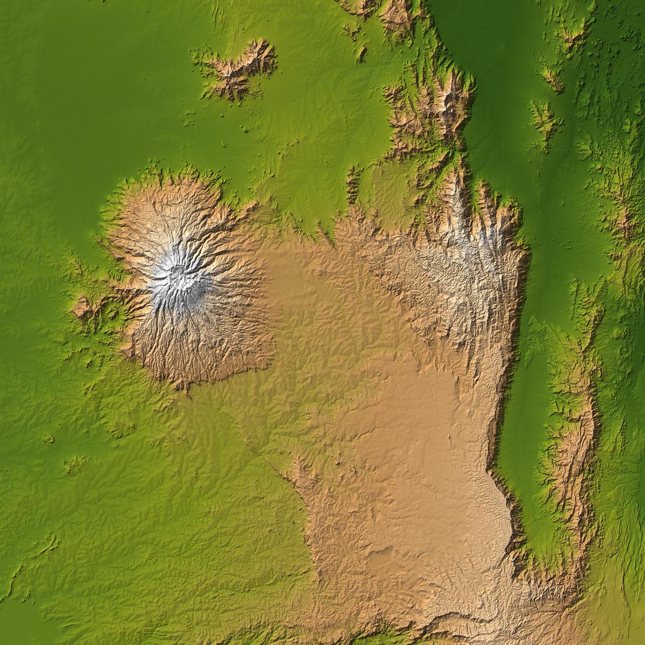 The striking contrast of geologic structures in Africa is shown in this shaded relief image of Mt. Elgon on the left and a section of the Great Rift Valley on the right.