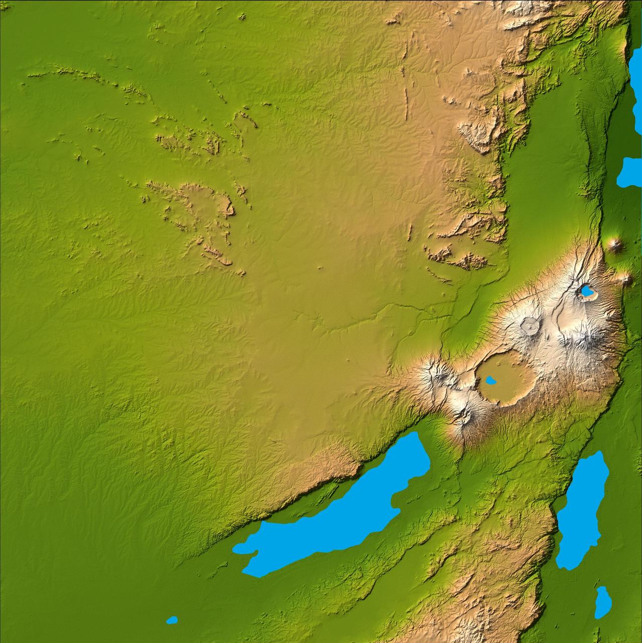 Three striking and important areas of Tanzania in eastern Africa are shown in this color-coded shaded relief image from NASA Shuttle Radar Topography Mission.