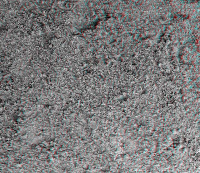 This image taken by the microscopic imager on NASA Mars Exploration Rover Spirit shows the powdery soil of Mars in 3-D. 3D glasses are necessary to view this image.