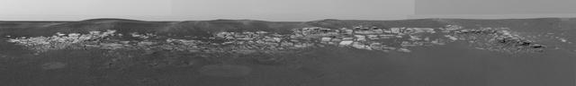 This sweeping look at the unusual rock outcropping near NASA Mars Exploration Rover Opportunity. 3D glasses are necessary to view this image.
