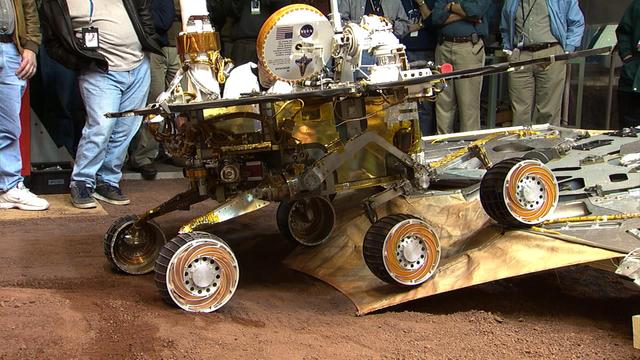 This image taken at JPL shows engineers testing the route by which the Mars Exploration Rover Opportunity will roll off its lander. Opportunity touched down at Meridiani Planum, Mars on Jan. 24, 9:05 p.m. PST, 2004, Earth-received time.