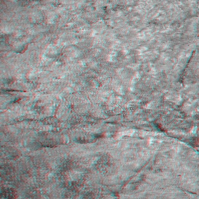 This 3-D image taken by the microscopic imager on NASA Mars Exploration Rover Opportunity shows a close-up of the center of the rock abrasion tool hole, ground into Bounce. 3D glasses are necessary to view this image.