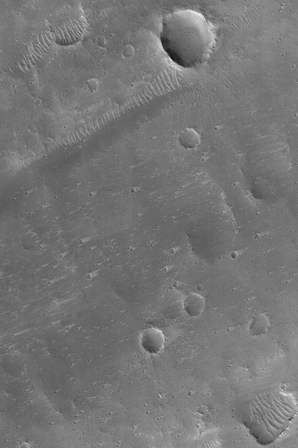 NASA image: Craters and Wind Streaks