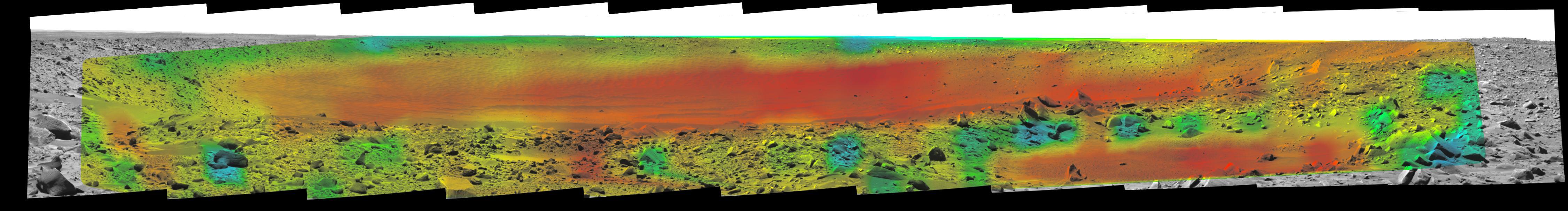Rates of change in surface temperatures during a martian day indicate differences in particle size in and near "Bonneville Crater." This image is the third in a series of five with color-coded temperature information from different times of day. This one is from 1:35 p.m. local solar time at the site where NASA's Mars Exploration Rover Spirit is exploring Mars. Temperature information from Spirit's miniature thermal emission spectrometer is overlaid onto a view of the site from Spirit's panoramic camera.  In this color-coded map, quicker reddening during the day suggests sand or dust. (Red is about 270 Kelvin or 27 degrees Fahrenheit.) An example of this is in the shallow depression in the right foreground. Areas that stay blue longer into the day have larger rocks. (Blue indicates about 230 Kelvin or minus 45 Degrees F.) An example is the rock in the left foreground.  http://photojournal.jpl.nasa.gov/catalog/PIA05930