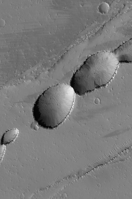Pits Near Rhabon Valles