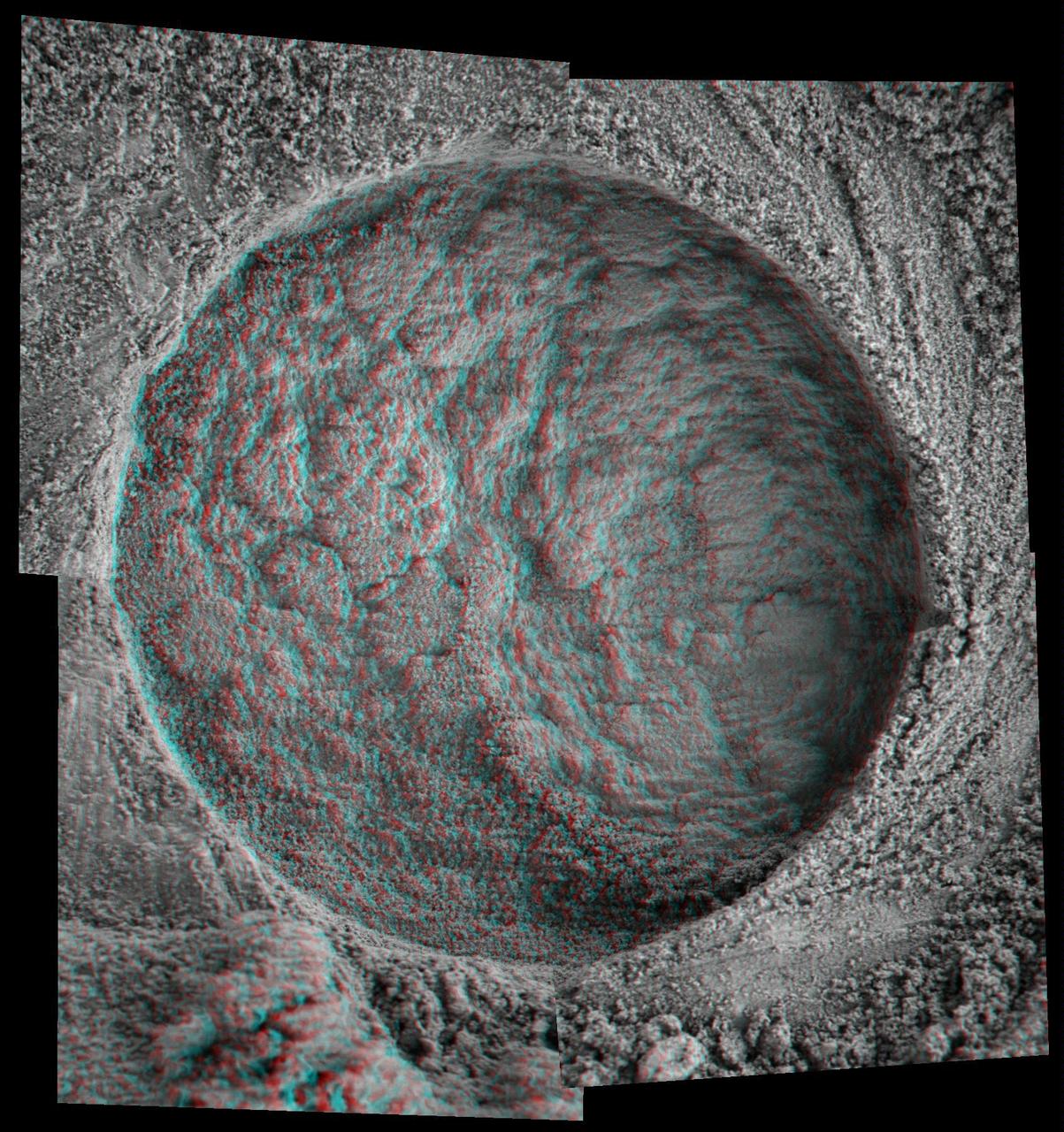 This 3-D, microscopic imager mosaic of a target area on a rock called Diamond Jenness was taken after NASA Mars Exploration Rover Opportunity ground into the surface with its rock abrasion tool for a second time. 3D glasses are necessary.