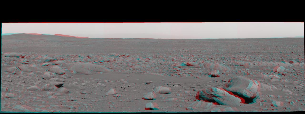 This stereo view was taken by the panoramic camera on NASA Mars Exploration Rover Spirit on the rover 87th martian day, or sol April 1, 2004, just after Spirit left Bonneville Crater. 3D glasses are necessary to view this image.