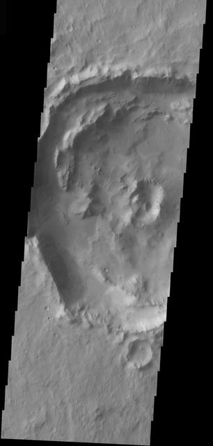 NASA image: Central Peak Crater in Lunae Planum
