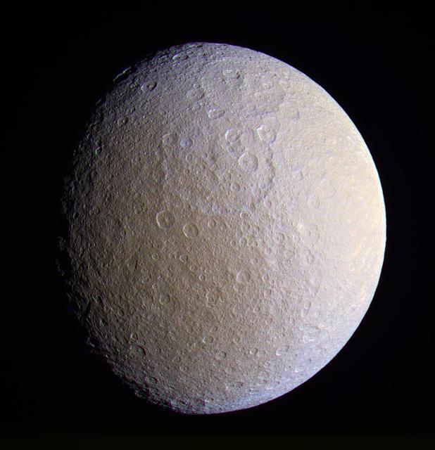 This close view of Rhea prominently shows two large impact basins on the ancient and battered moon. The great age of these basins is suggested by the large number of smaller craters that are overprinted within them. Terrain visible in this view is on the side of Rhea (1,528 kilometers, or 949 miles across) that faces away from Saturn. North on Rhea is up and tilted 30 degrees to the left. This enhanced color view was created by combining images taken using filters sensitive to ultraviolet, visible green and infrared light. The images were taken with the Cassini spacecraft narrow-angle camera on Dec. 23, 2005, at a distance of approximately 341,000 kilometers (212,000 miles) from Saturn and at a Sun-Saturn-spacecraft, or phase, angle of 42 degrees. The image scale is 2 kilometers (1 mile) per pixel. http://photojournal.jpl.nasa.gov/catalog/PIA07686