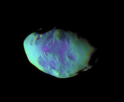 These views show surface features and color variation on the Trojan moon Telesto. The smooth surface of this moon suggests that, like Pandora, it is covered with a mantle of fine, dust-sized icy material.  The monochrome image was taken in visible light (see PIA07696). To create the false-color view, ultraviolet, green and infrared images were combined into a single black and white picture that isolates and maps regional color differences. This "color map" was then superposed over a clear-filter image. The origin of the color differences is not yet understood, but may be caused by subtle differences in the surface composition or the sizes of grains making up the icy soil.  Tiny Telesto is a mere 24 kilometers (15 miles) wide.  The image was acquired with the Cassini spacecraft narrow-angle camera on Dec. 25, 2005 at a distance of approximately 20,000 kilometers (12,000 miles) from Telesto and at a Sun-Telesto-spacecraft, or phase, angle of 58 degrees. Image scale is 118 meters (387 feet) per pixel.  http://photojournal.jpl.nasa.gov/catalog/PIA07697