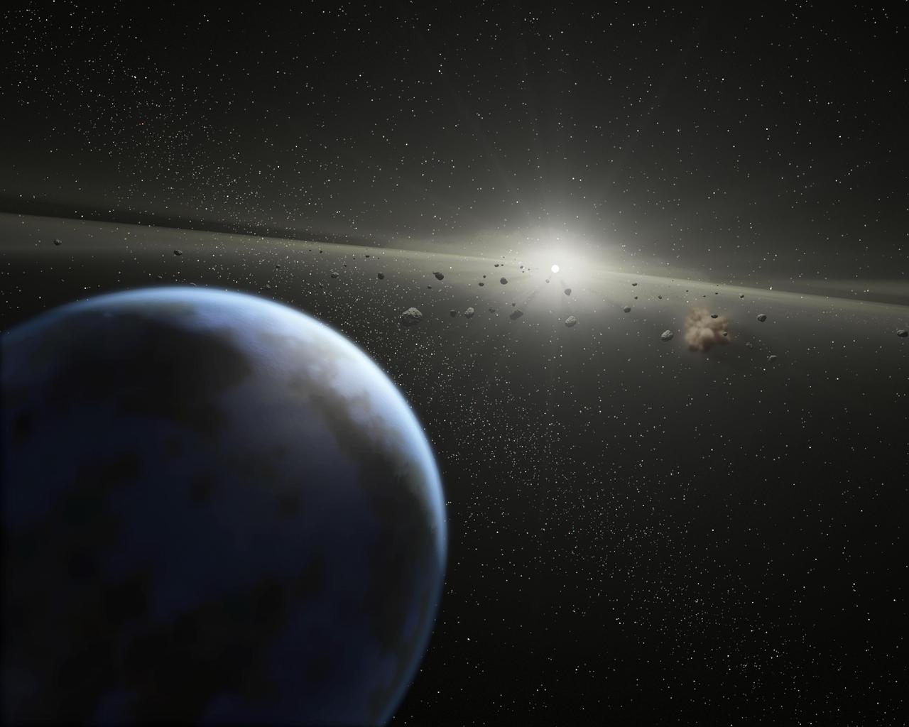 Evidence for this possible belt was discovered by NASA Spitzer Space Telescope when it spotted warm dust around the star, presumably from asteroids smashing together. This is an artist concept.