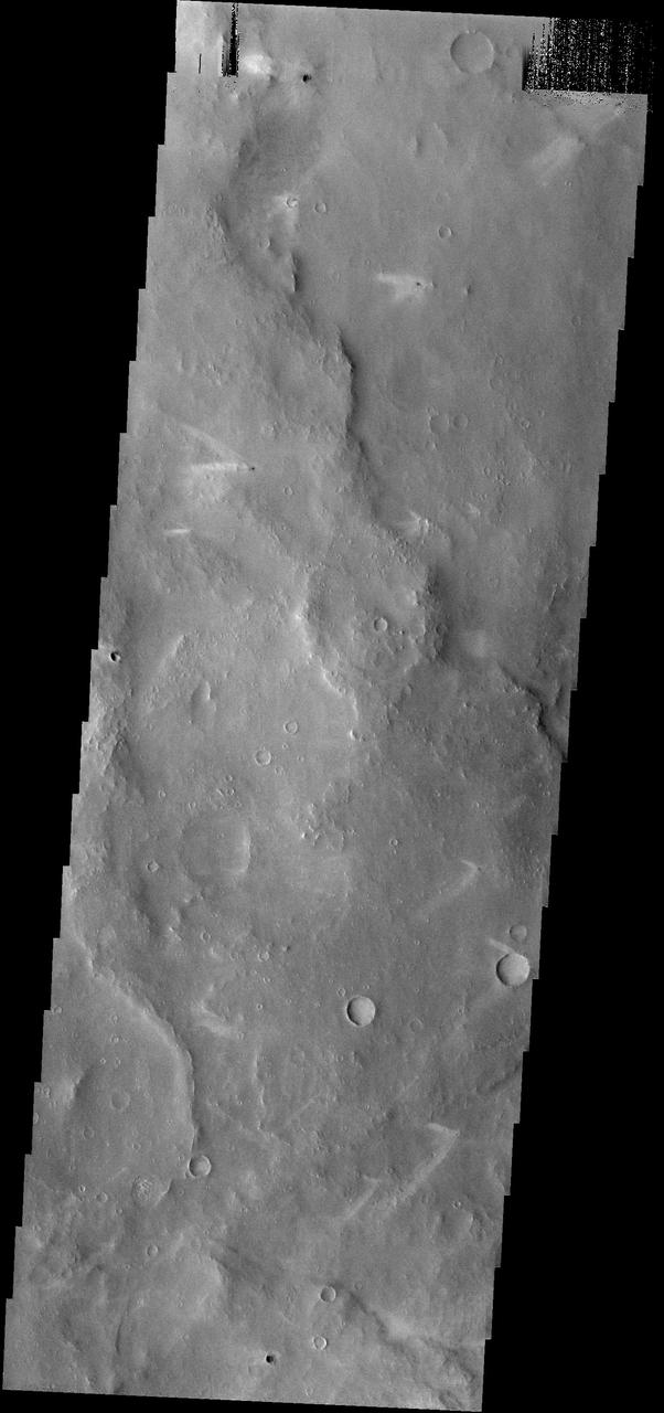 The windstreaks in this area northwest of Schiaparelli Crater point in three different directions. This indicates that the wind shifts/ed with time