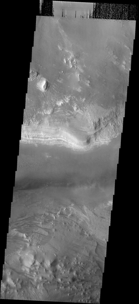 This image shows a small portion of the layered deposits found in Melas  Chasma