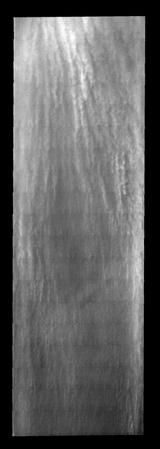 These linear clouds are part of a large storm front that occurred near the  south pole during late summer