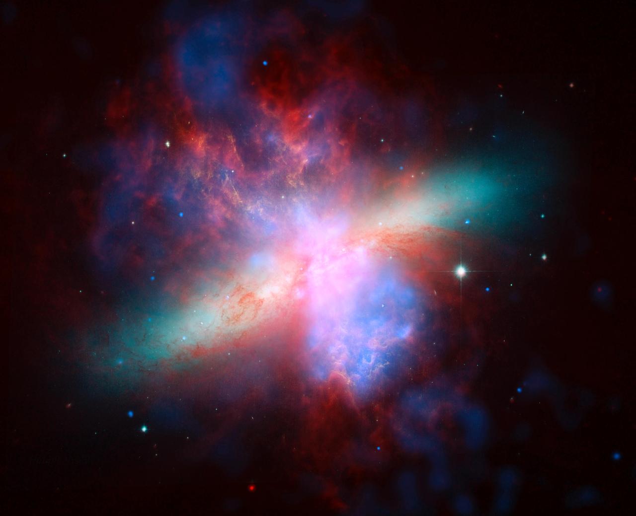 NASA Spitzer, Hubble and Chandra space observatories teamed up to create this multi-wavelength, false-colored view of the M82 galaxy. The lively   portrait celebrates Hubble weet sixteen birthday.