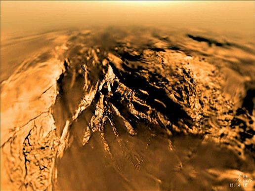 This image is from data collected during the 147-minute plunge through Titan thick orange-brown atmosphere to a soft sandy riverbed by the European Space Agency Huygens Descent Imager/Spectral Radiometer on Jan. 14, 2005.