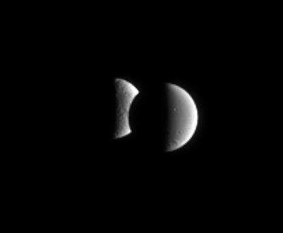 Dione steps in front of Tethys for a few minutes in an occultation, or  mutual event. These events occur frequently for the Cassini spacecraft  when it is orbiting close to the ringplane