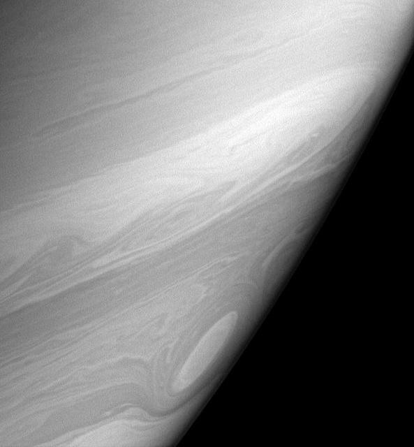 Bright, high altitude clouds, like those imaged here, often appear more filamentary or streak-like than clouds imaged at slightly deeper levels in Saturn atmosphere. This view also shows one of the many cat eye vortices.
