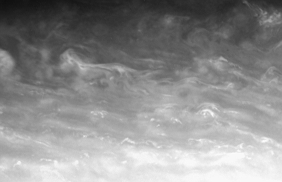 The bright whorls and small-scale specks of convective clouds drift through a region just north of Saturn bright equatorial band. Observers have seen major storms develop in this region in the past 15-20 years